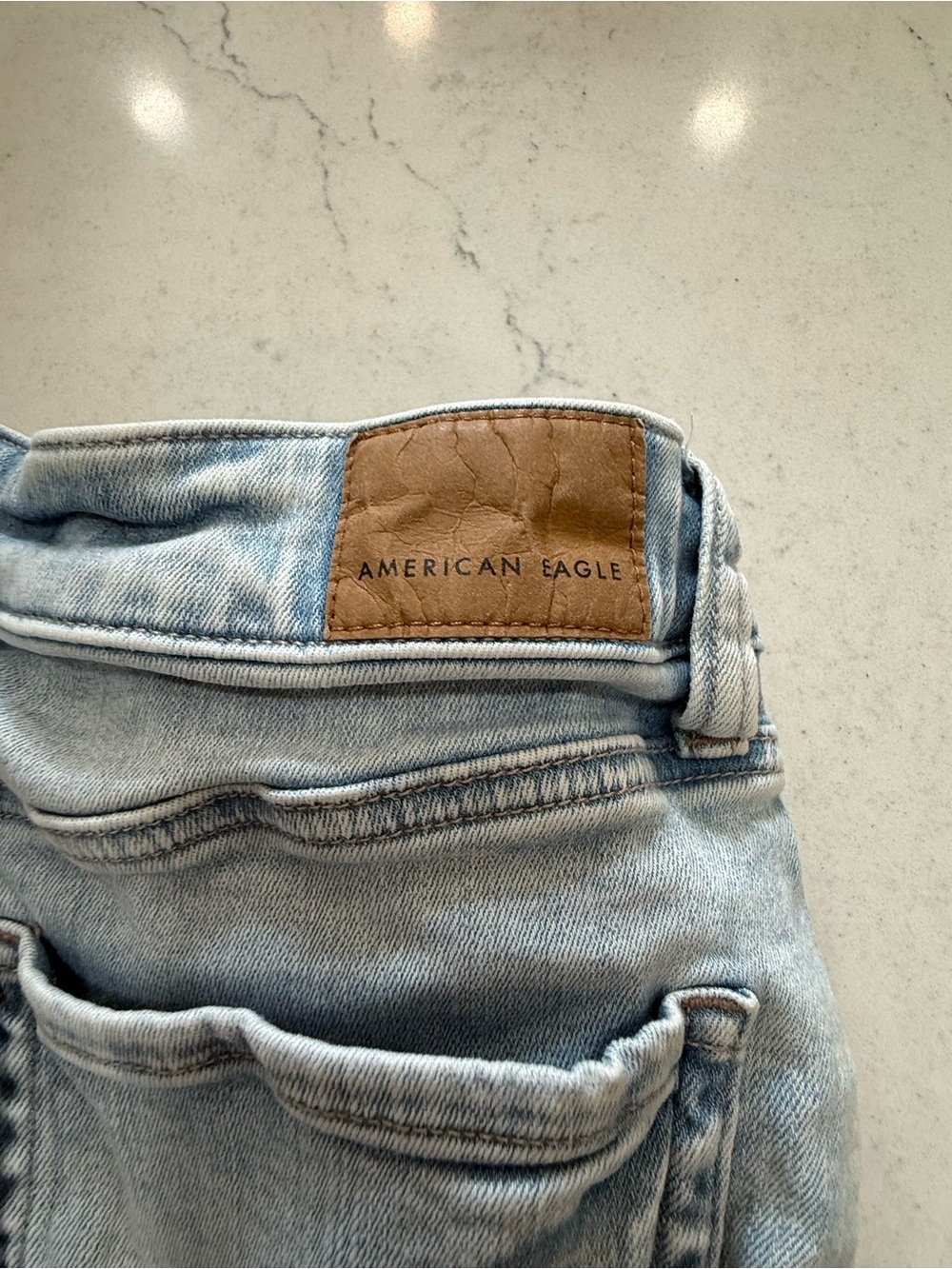 American Eagle Next Level Stretch Denim High Rise Light Wash Distressed Shorts 2 - Picture 3 of 5
